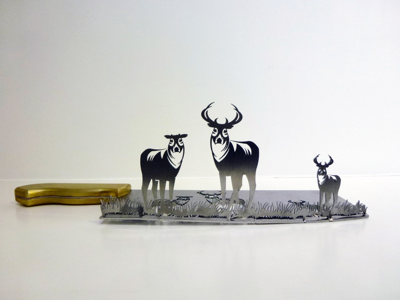 Illustration for article titled Intricate shadow silhouettes carved out of butcher's knife blades